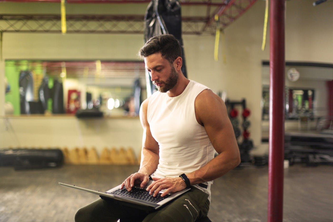 Business owner tracking gym revenue and expenses on in2 financial dashboard